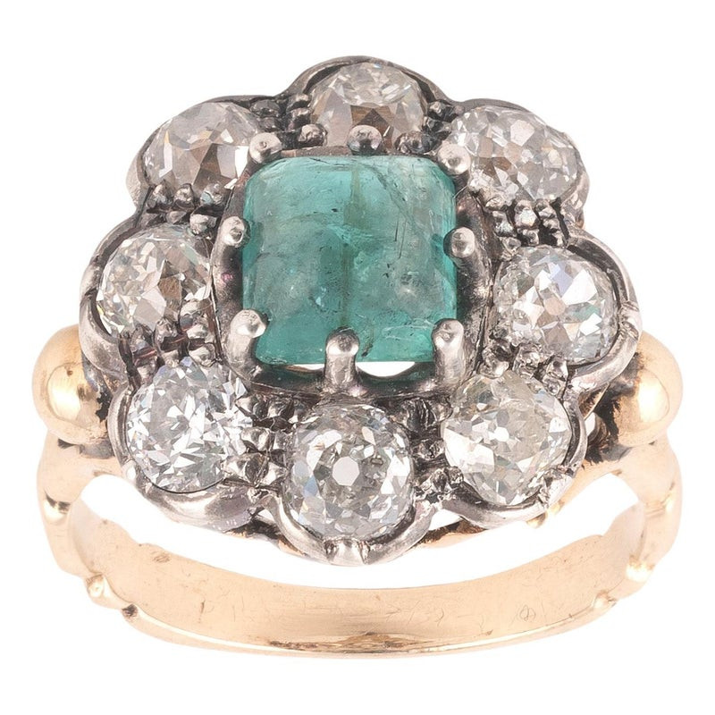 A Cabochon Emerald And Diamond Cluster Ring