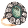 An Emerald And Old Cut Diamond Cluster Ring