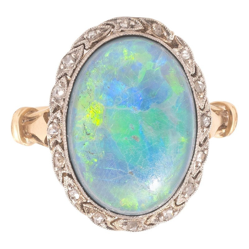 A Black Opal And Diamond Cluster Ring