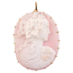 A Conch Shell Cameo Brooch...