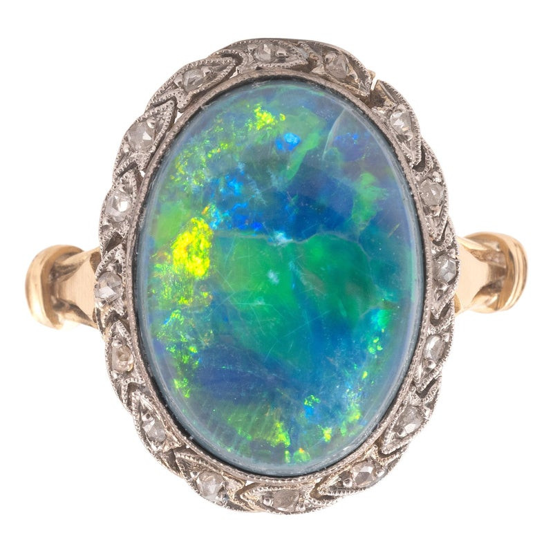 A Black Opal And Diamond Cluster Ring